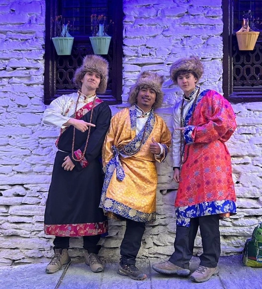 trekkers posing at everest base camp